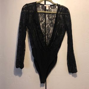 Black lace body suit. Dress it up or dress down.